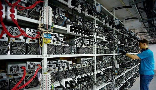A modern ASIC miner, the workhorse of Bitcoin mining, undergoing maintenance